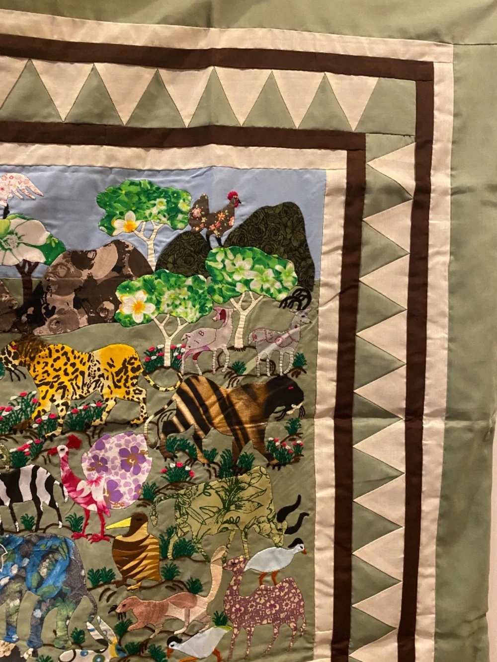 Quilt-style wall hanging with animal designs for decorating a child's room (New)
